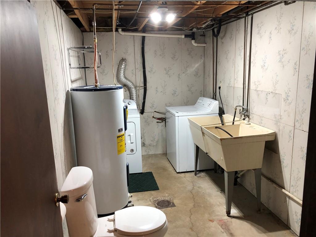 140 Redstone Furnace Road Hopwood, PA 15445 - Photo 35 of 38 a bathroom with a sink toilet and shower