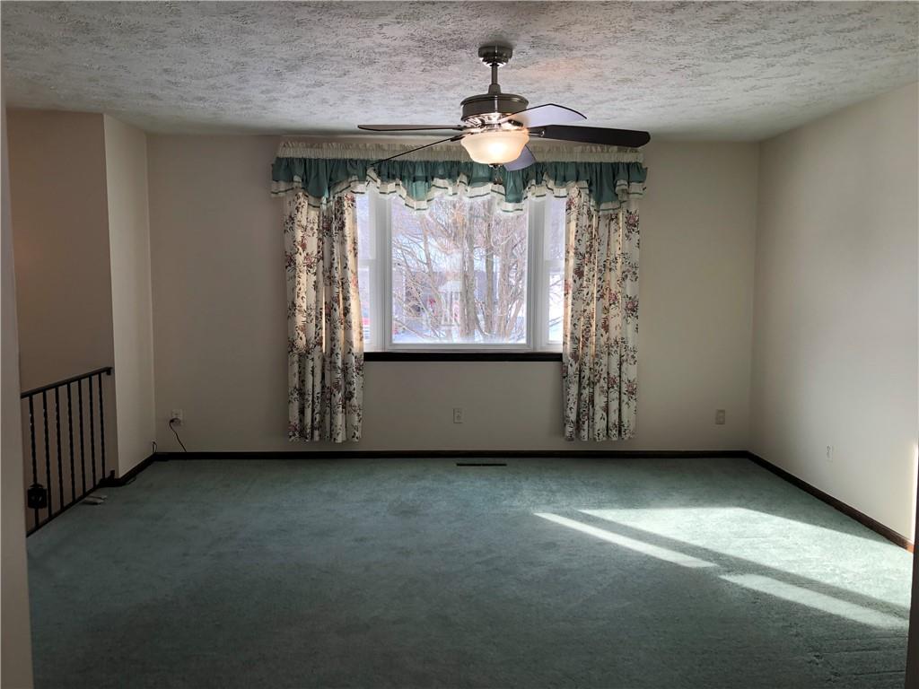 140 Redstone Furnace Road Hopwood, PA 15445 - Photo 6 of 38 an empty room with windows