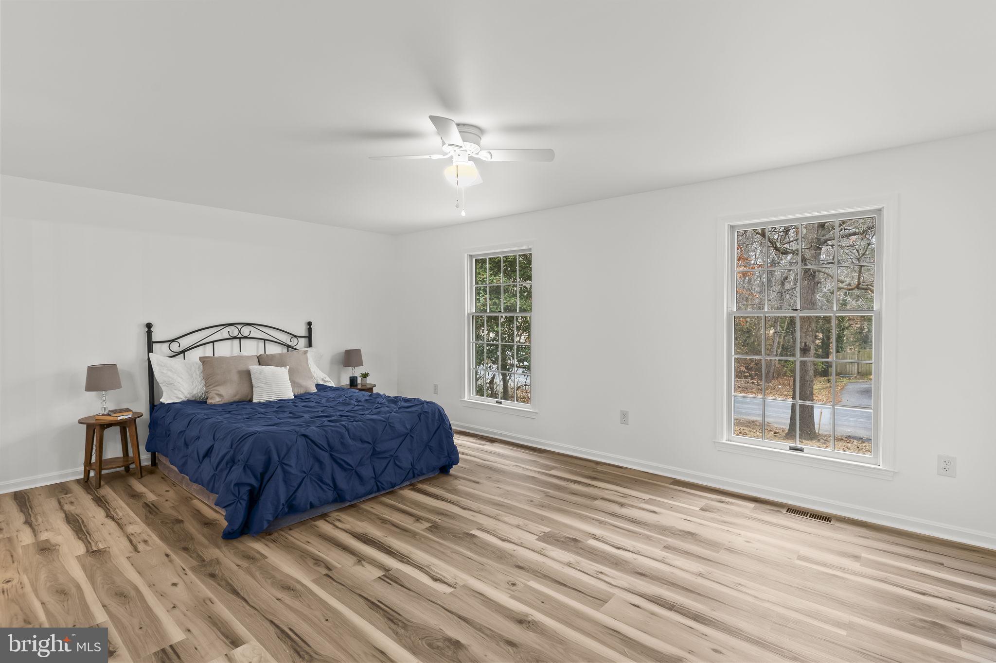 11223 Rawhide Road Lusby, MD 20657 - Photo 15 of 33 a bedroom with a bed and window