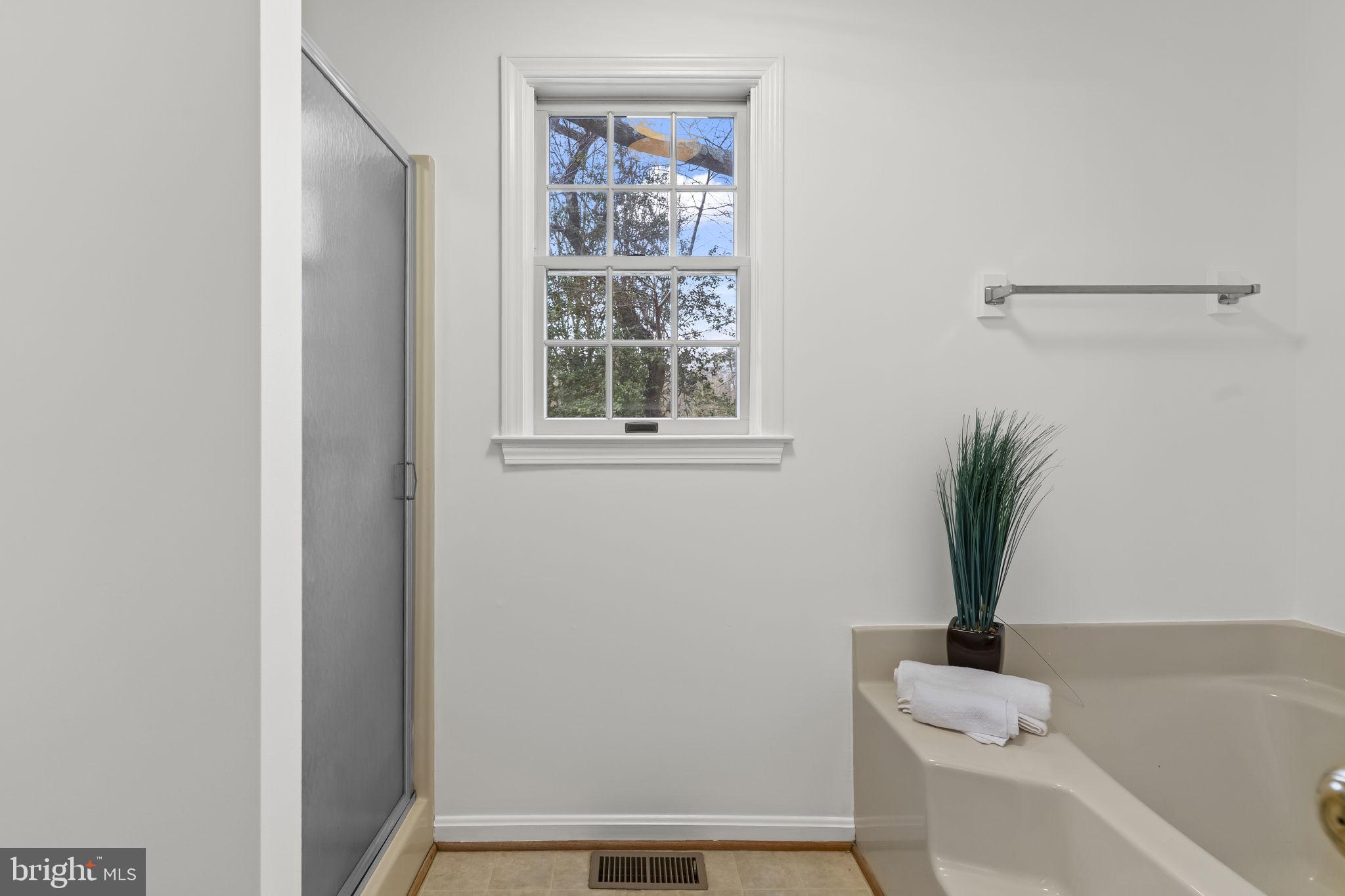 11223 Rawhide Road Lusby, MD 20657 - Photo 18 of 33 a bathroom with a shower