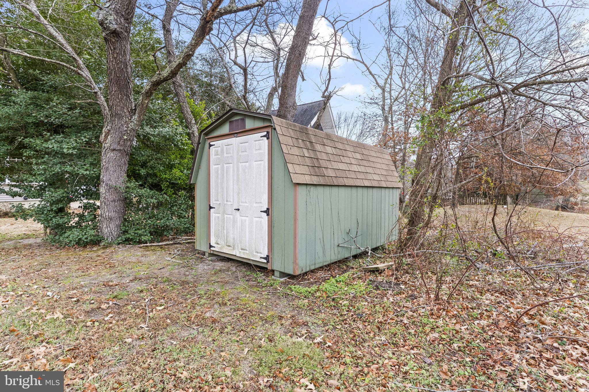 11223 Rawhide Road Lusby, MD 20657 - Photo 28 of 33 a view of a backyard