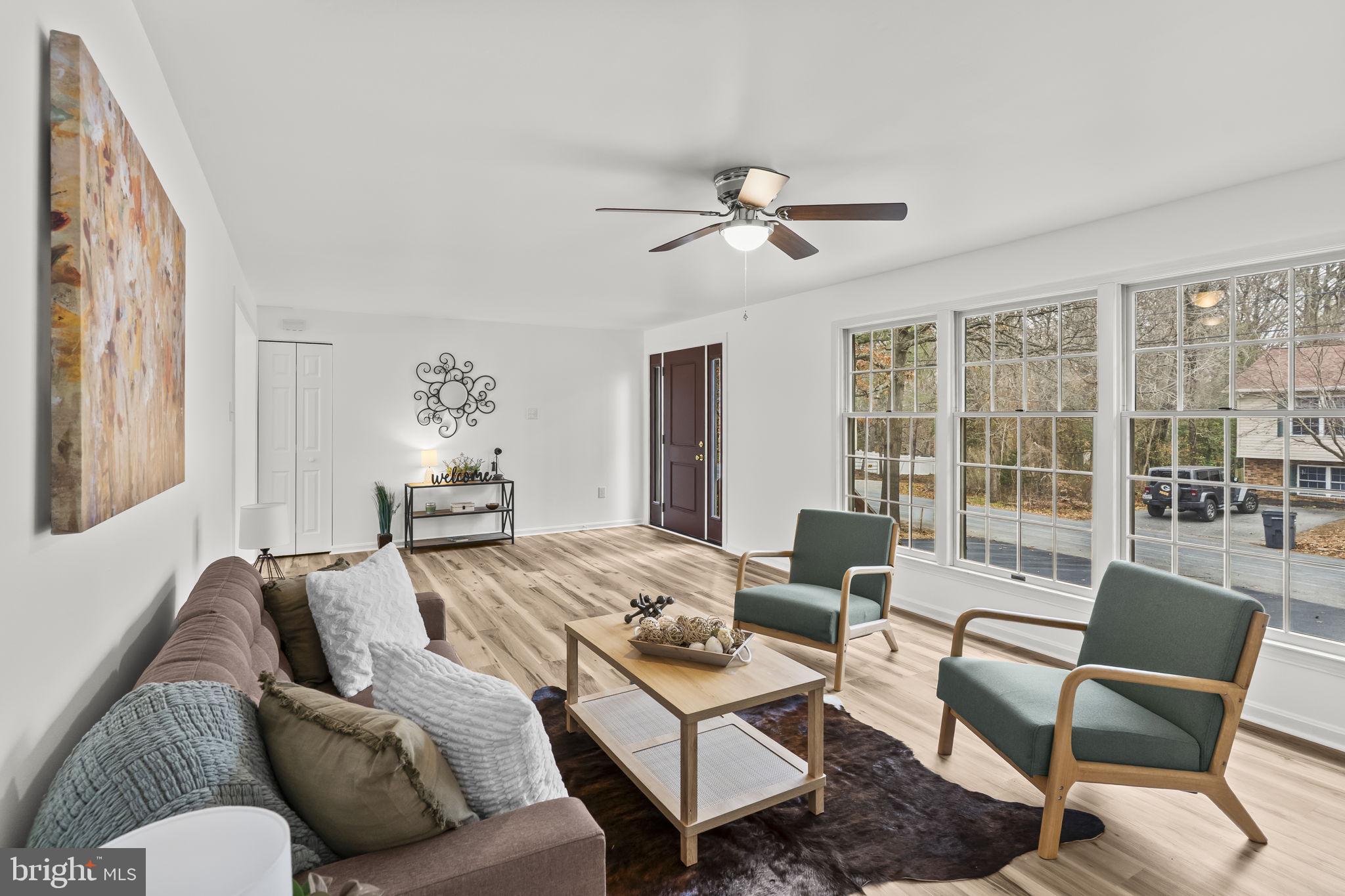 11223 Rawhide Road Lusby, MD 20657 - Photo 3 of 33 a living room with furniture and a window