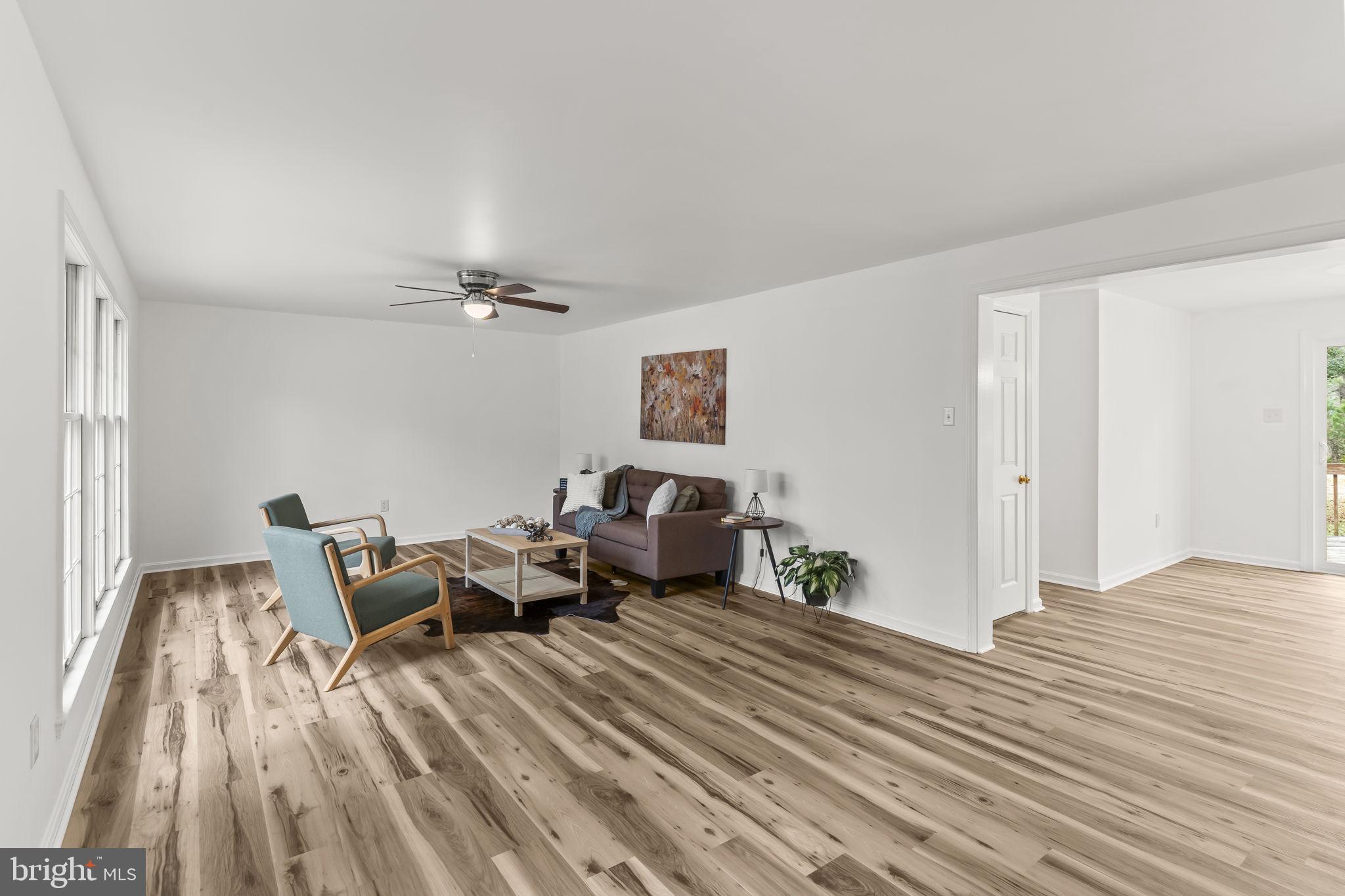 11223 Rawhide Road Lusby, MD 20657 - Photo 4 of 33 a living room with furniture