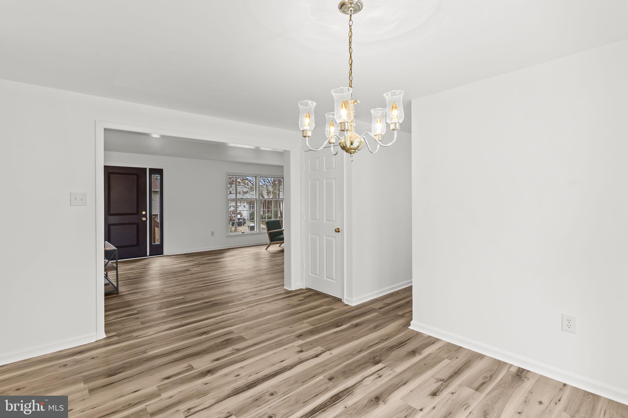 11223 Rawhide Road Lusby, MD 20657 - Photo 6 of 33 a view of a livingroom with wooden floor