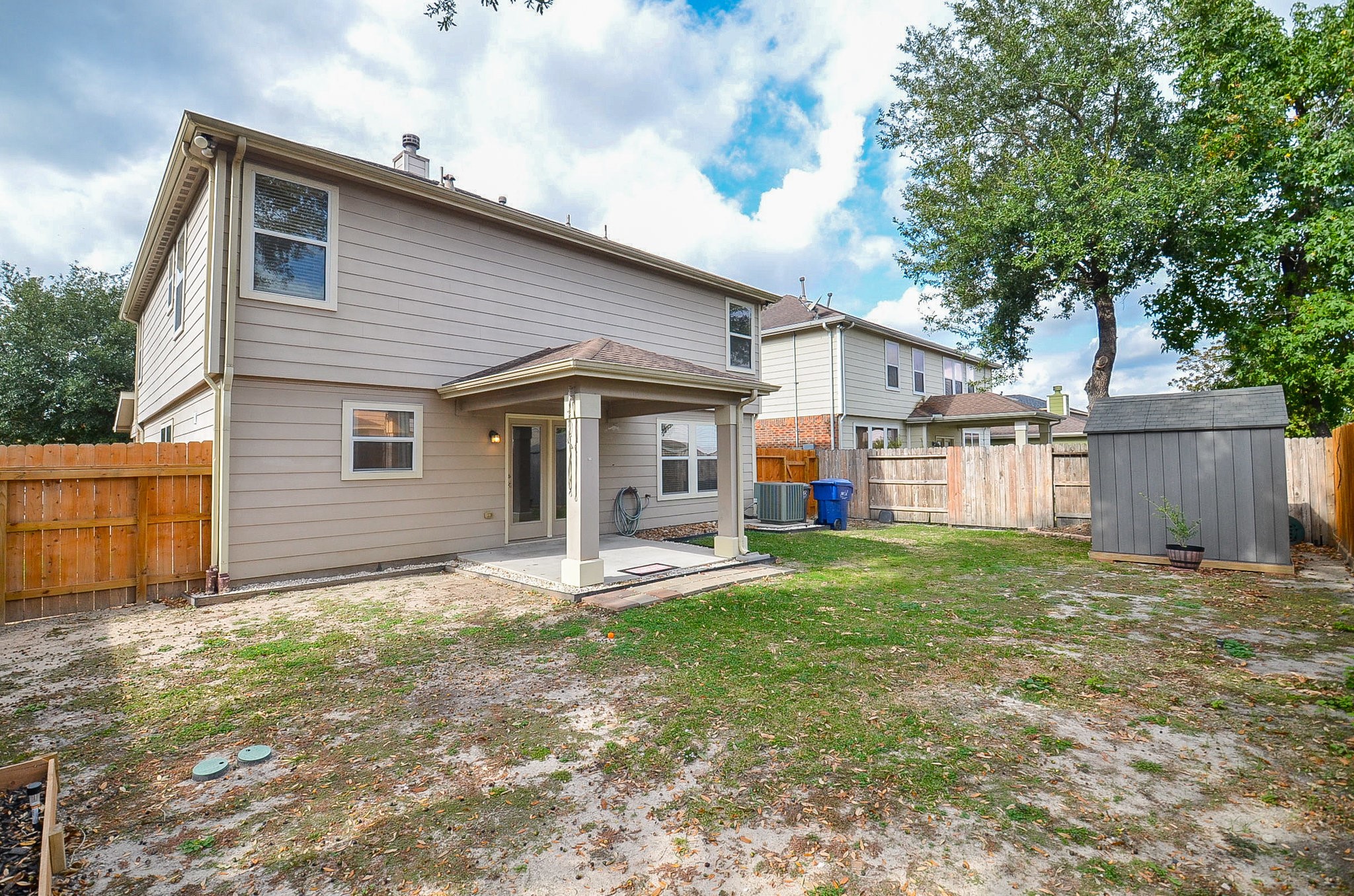 29610 Benson Springs Lane Spring, TX 77386 - Photo 25 of 25 a front view of a house with a garden and trees
