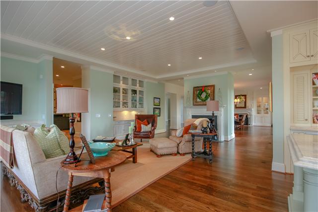 4545 Peytonsville Road Franklin, TN 37064 - Photo 8 of 20 THE COZY FAMILY ROOM IS LOCATED RIGHT OFF THE KITCHEN AND OVERLOOKS THE POOL, SPA AND OUTDOOR LIVING AREAS. THE FAMILY ROOM FEATURES GLASS CABINET BUILT-INS, WOOD BURNING FIREPLACE AND TRAY CEILING WITH TONGUE AND GROOVE BEADBOARD.