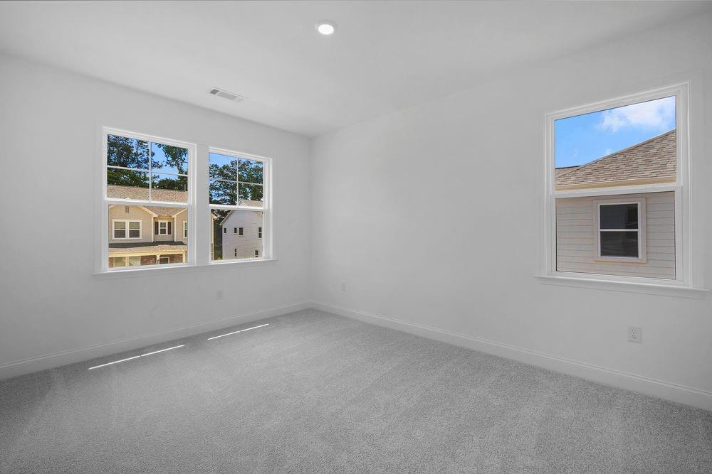 8925 Avonbrook Cl Ball Ground, GA 30107 - Photo 23 of 48 a view of an empty room with a window