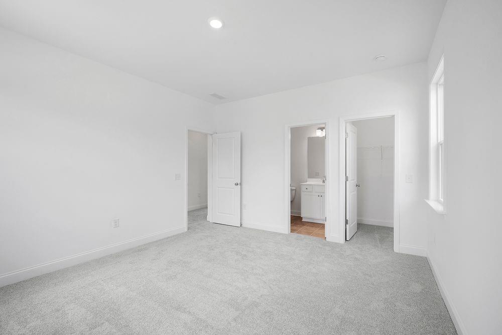 8925 Avonbrook Cl Ball Ground, GA 30107 - Photo 26 of 48 a view of an empty room