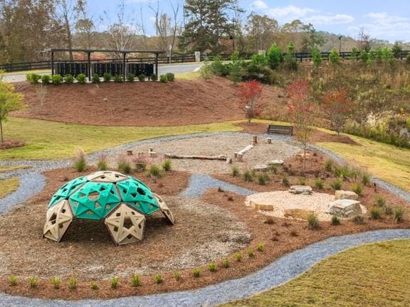 8925 Avonbrook Cl Ball Ground, GA 30107 - Photo 32 of 48 a view of a lake with a mountain