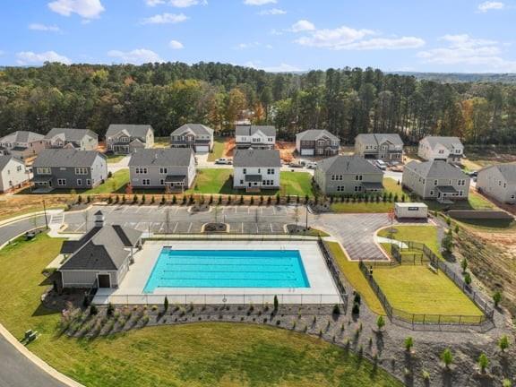 8925 Avonbrook Cl Ball Ground, GA 30107 - Photo 42 of 48 a view of swimming pool with outdoor seating