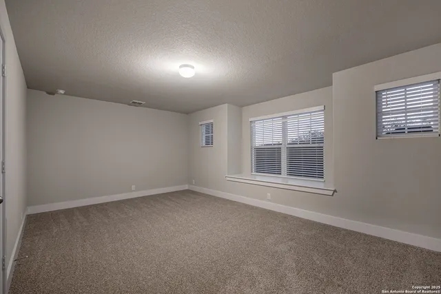 an aerial view of a house having yard