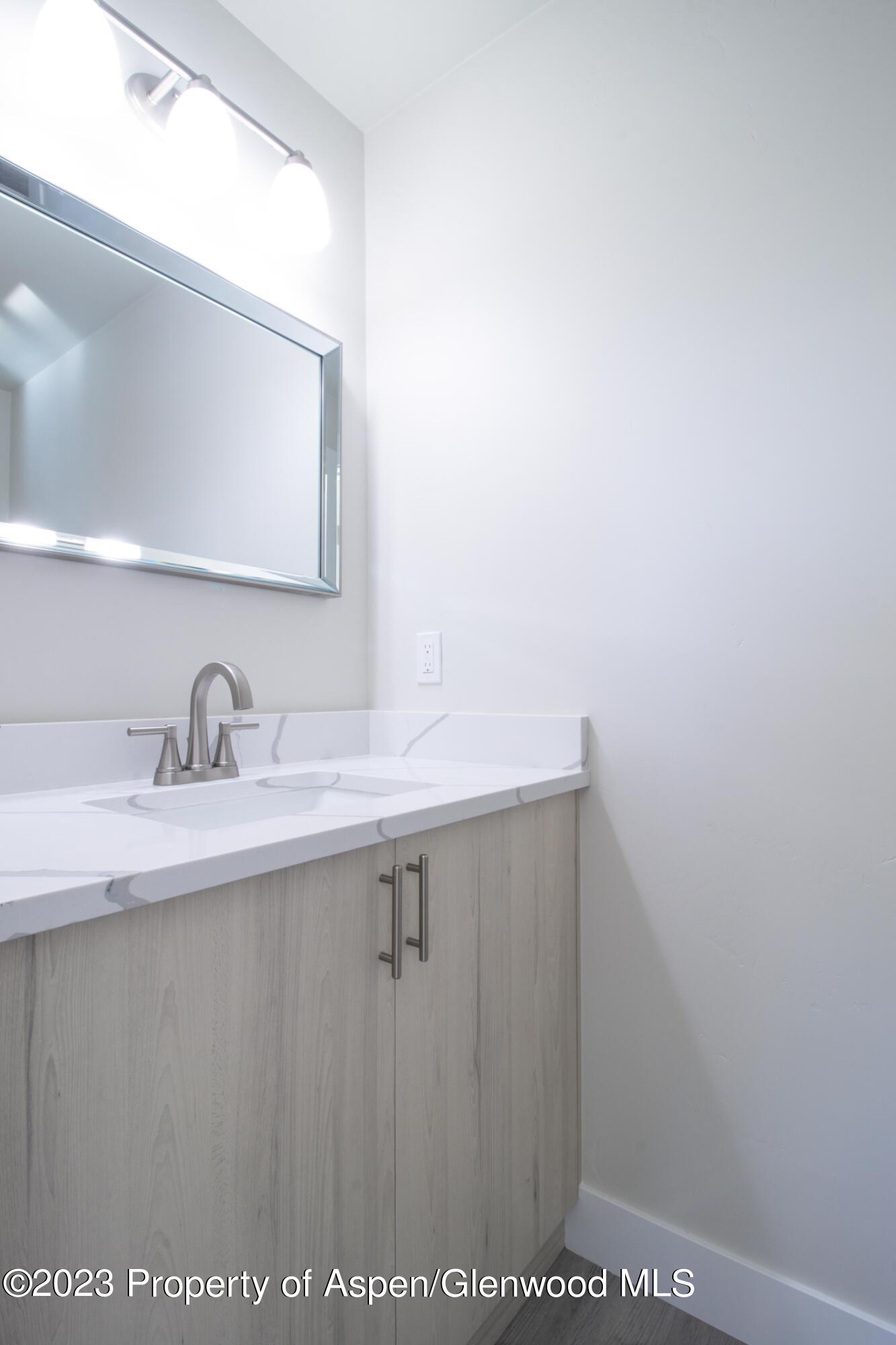 1762 Belgian Loop Silt, CO 81652 - Photo 12 of 18 a close view of sink and mirror