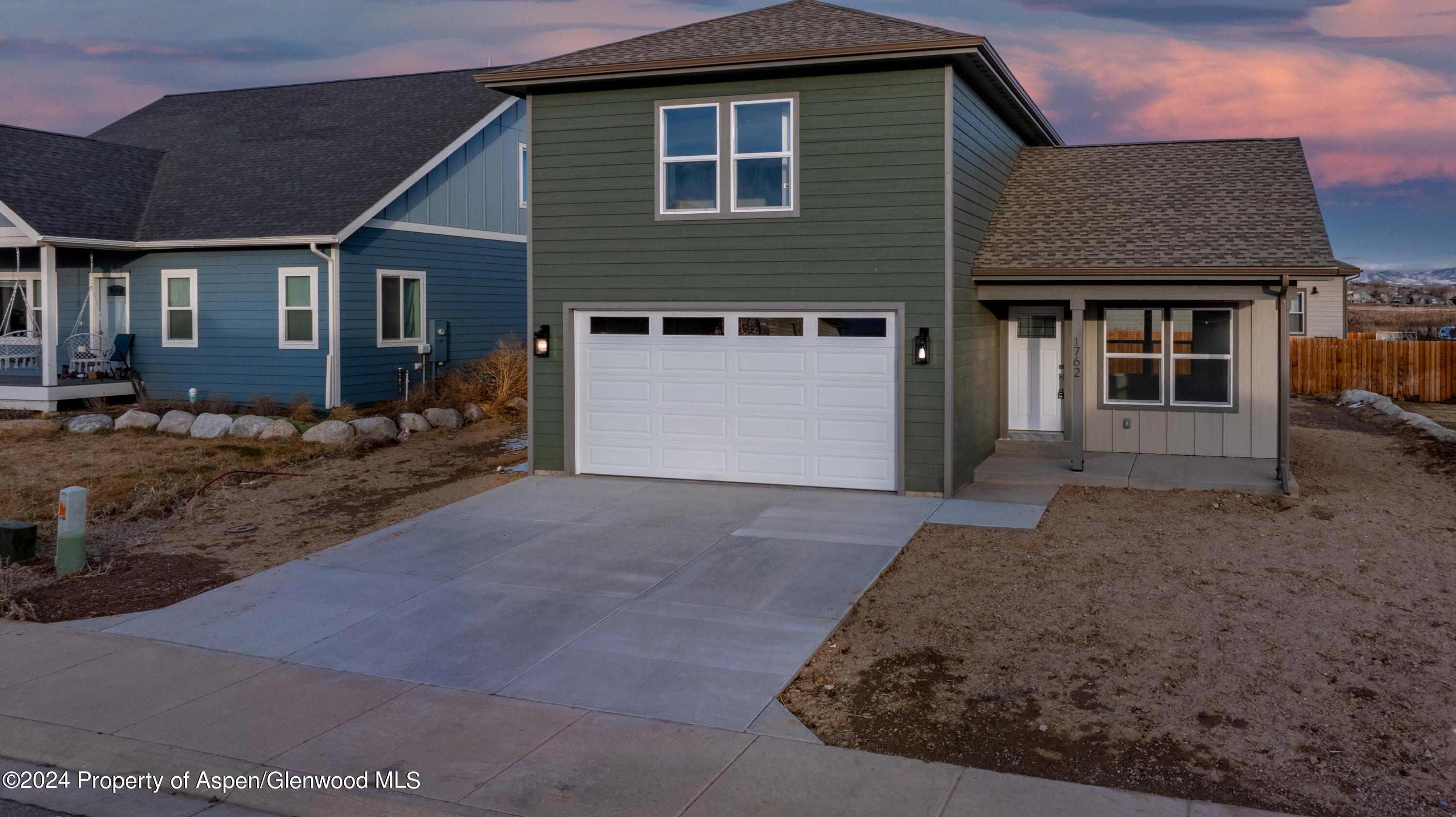 1762 Belgian Loop Silt, CO 81652 - Photo 13 of 18 a front view of a house with a yard