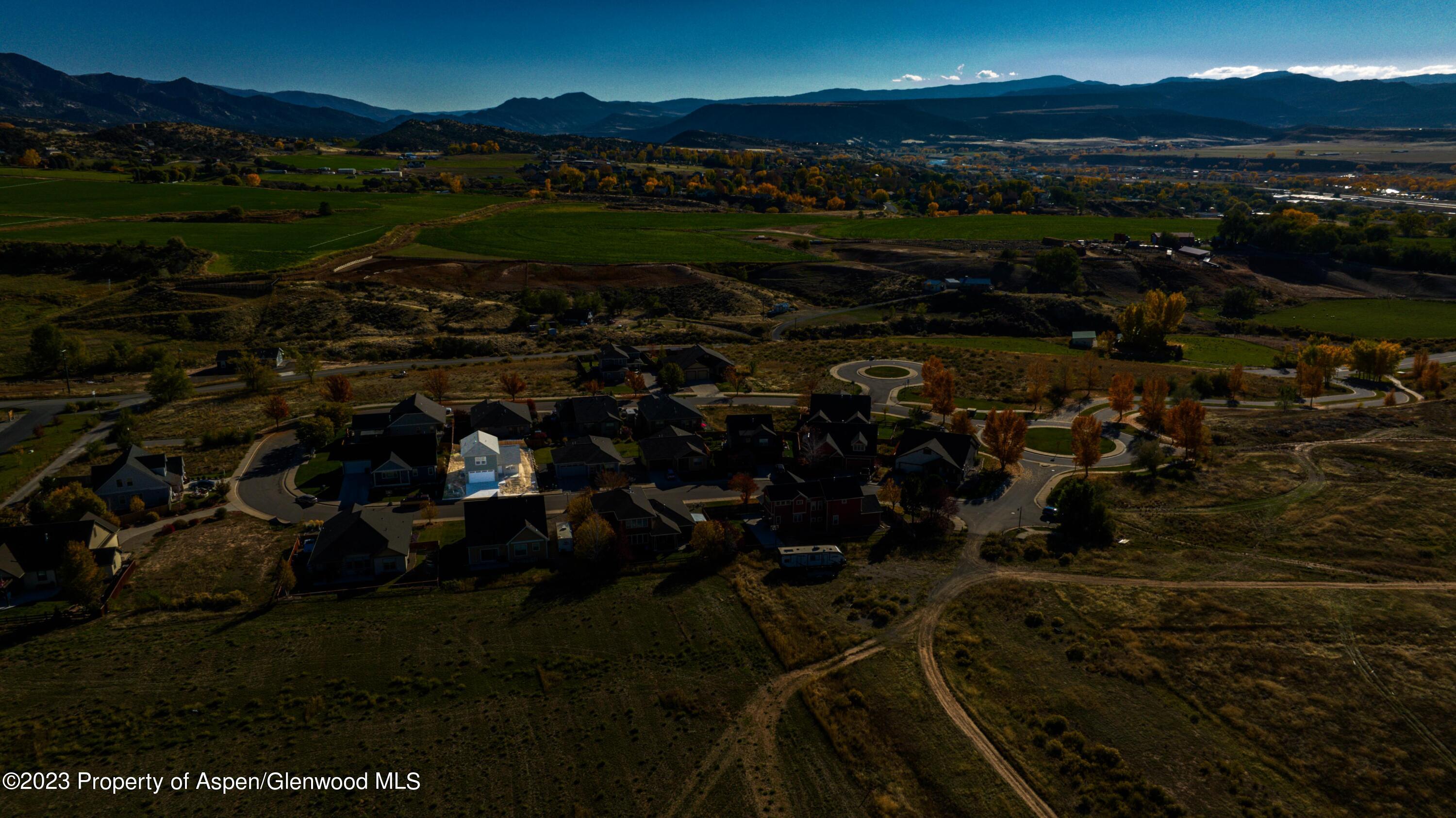 1762 Belgian Loop Silt, CO 81652 - Photo 15 of 18 a view of a golf course with a lake