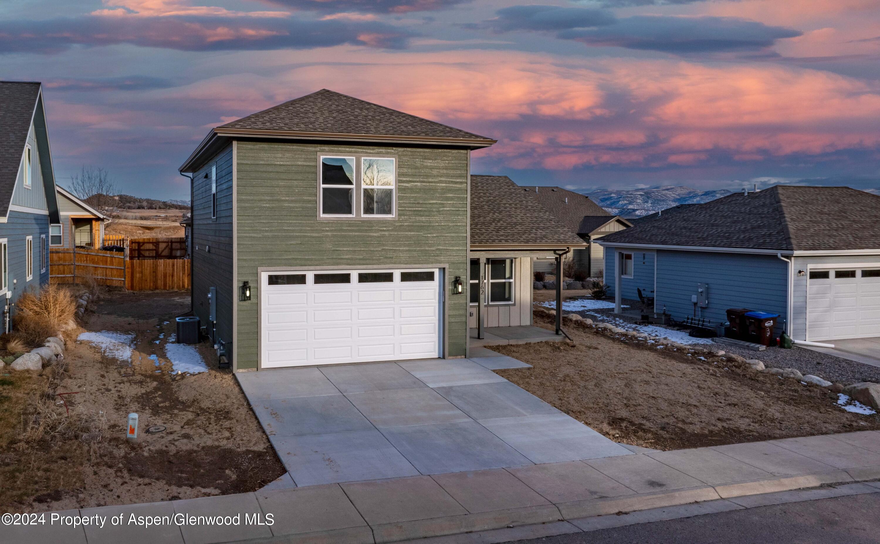 1762 Belgian Loop Silt, CO 81652 - Photo 17 of 18 a front view of a house with a yard