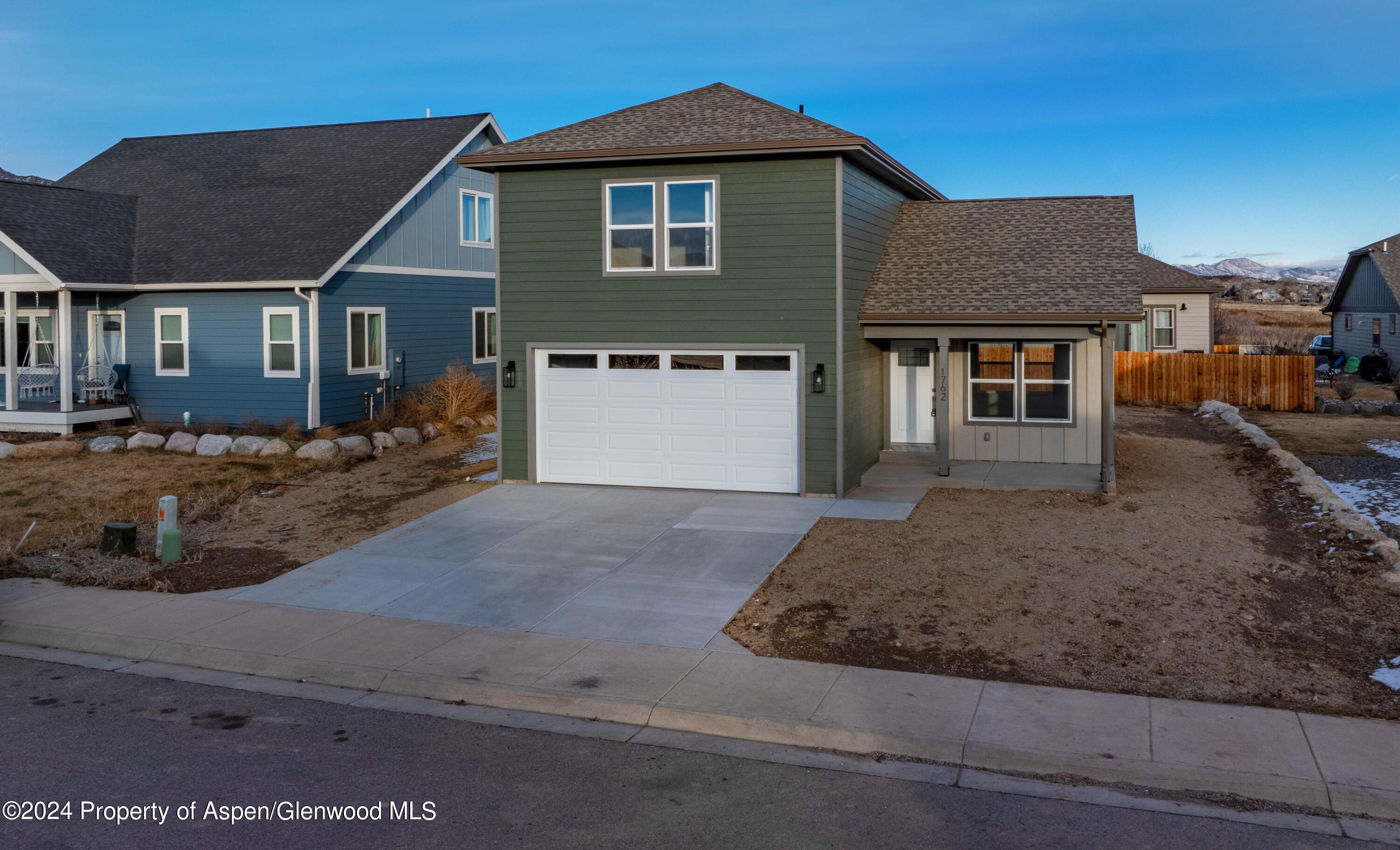 1762 Belgian Loop Silt, CO 81652 - Photo 18 of 18 a front view of a house with a yard