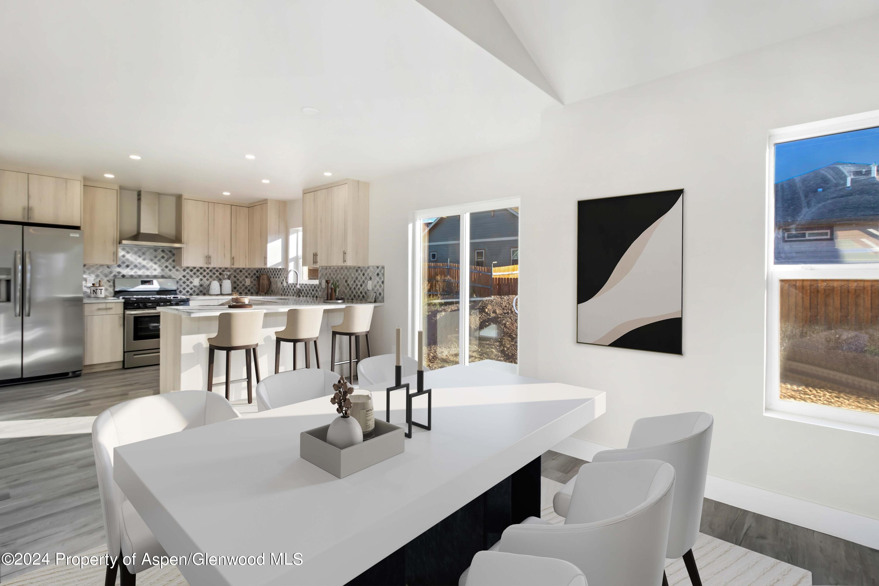 1762 Belgian Loop Silt, CO 81652 - Photo 5 of 18 a dining room with furniture and window