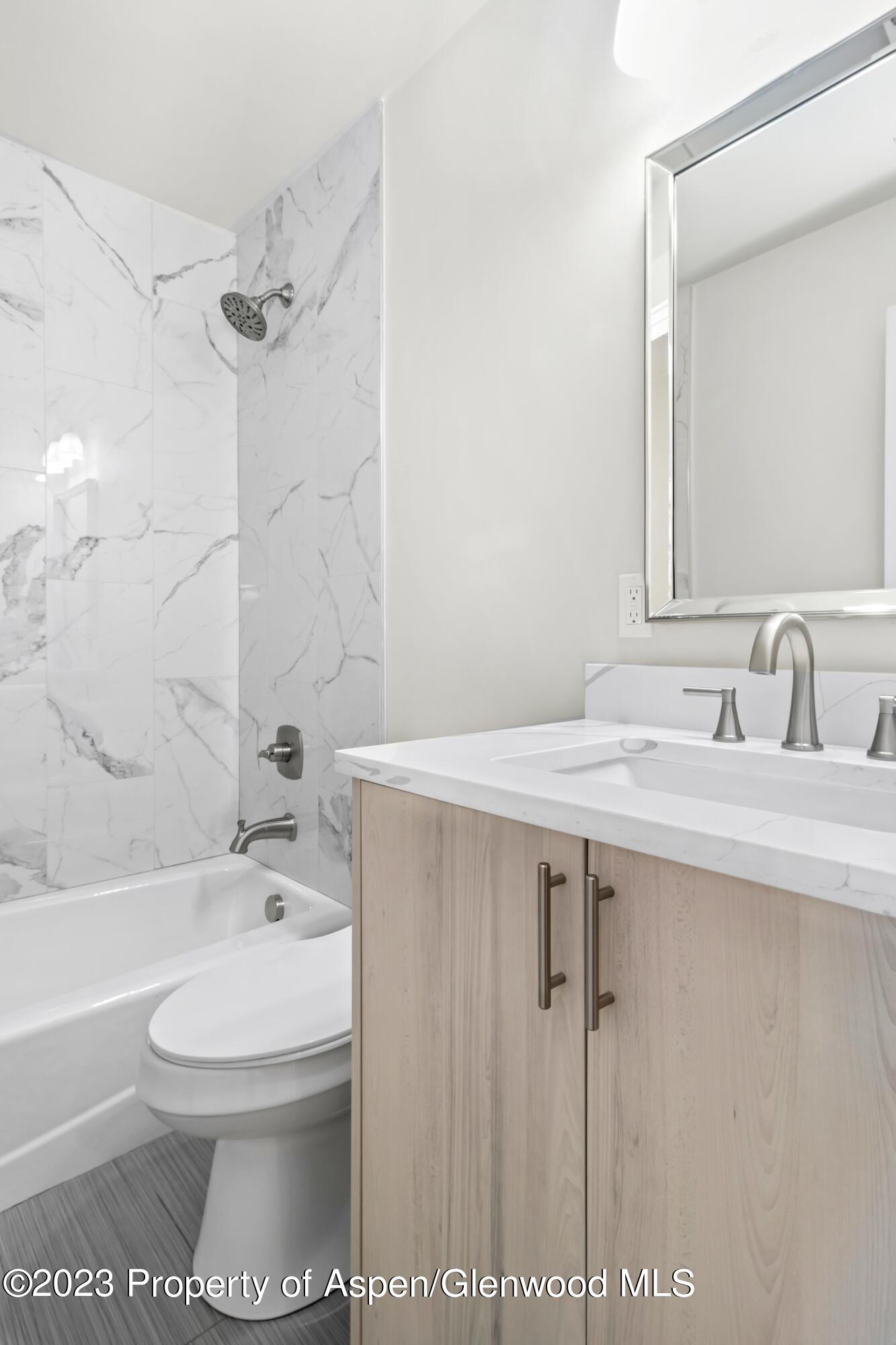 1762 Belgian Loop Silt, CO 81652 - Photo 8 of 18 a bathroom with a sink toilet and shower