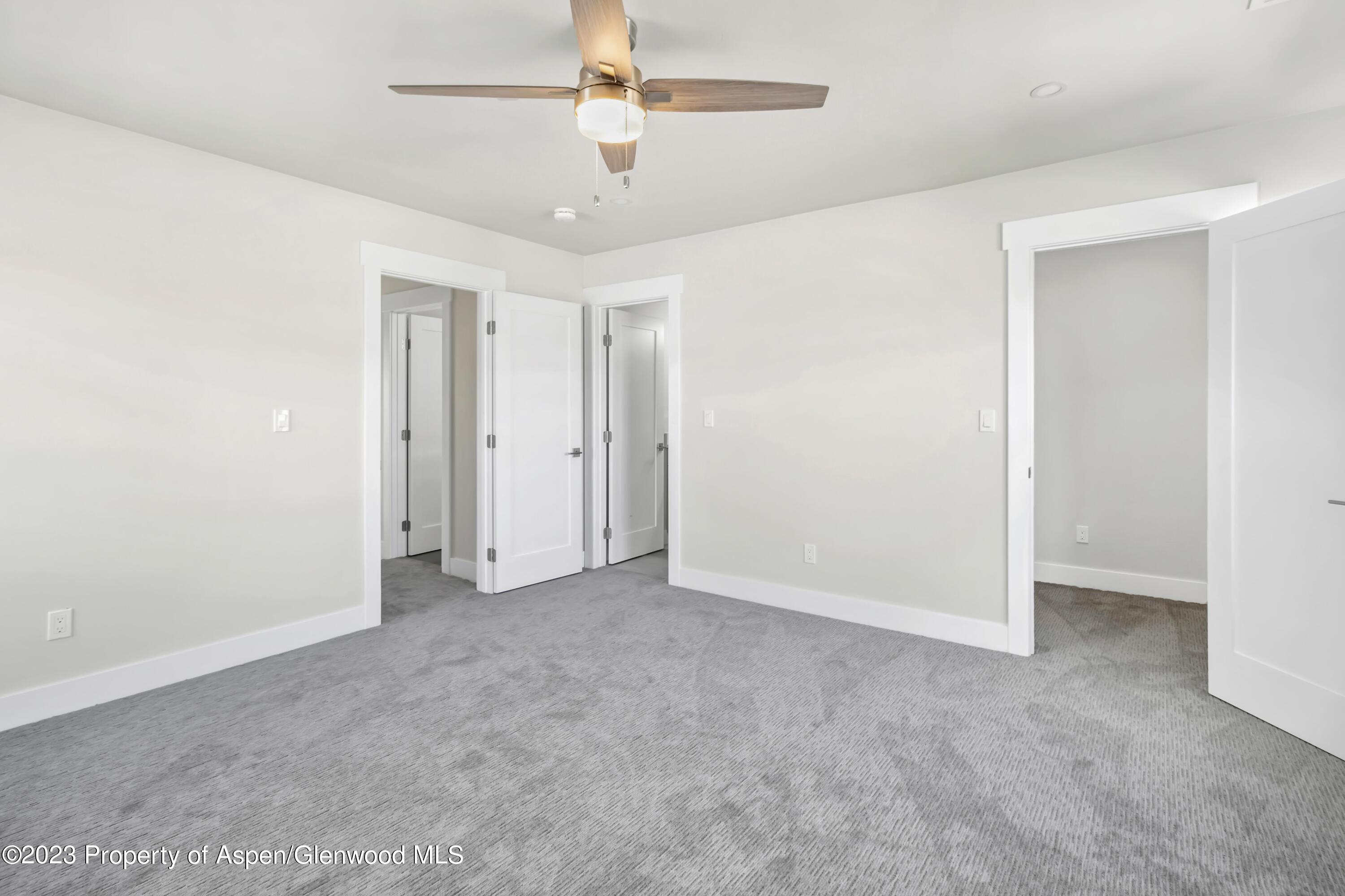 1762 Belgian Loop Silt, CO 81652 - Photo 9 of 18 an empty room with fan ceiling fan and window