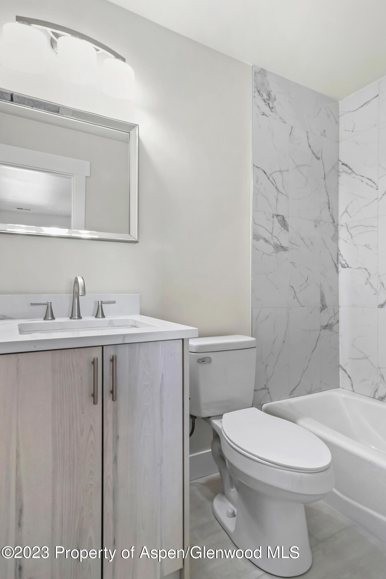 1762 Belgian Loop Silt, CO 81652 - Photo 10 of 18 a bathroom with a sink a toilet and shower