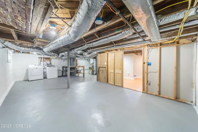 a view of empty room with wooden walls