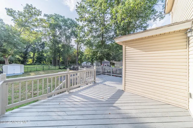a view of a house with a deck