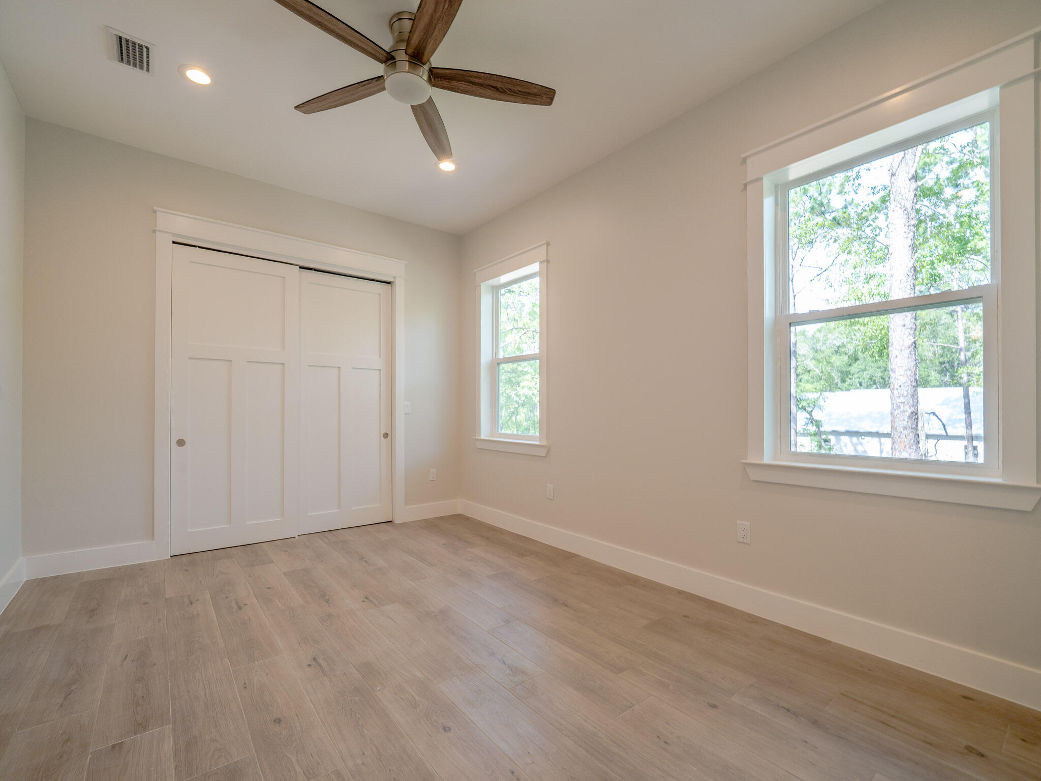 116 East Georgie Street Point Washington, FL 32459 - Photo 19 of 46 a view of an empty room with a window
