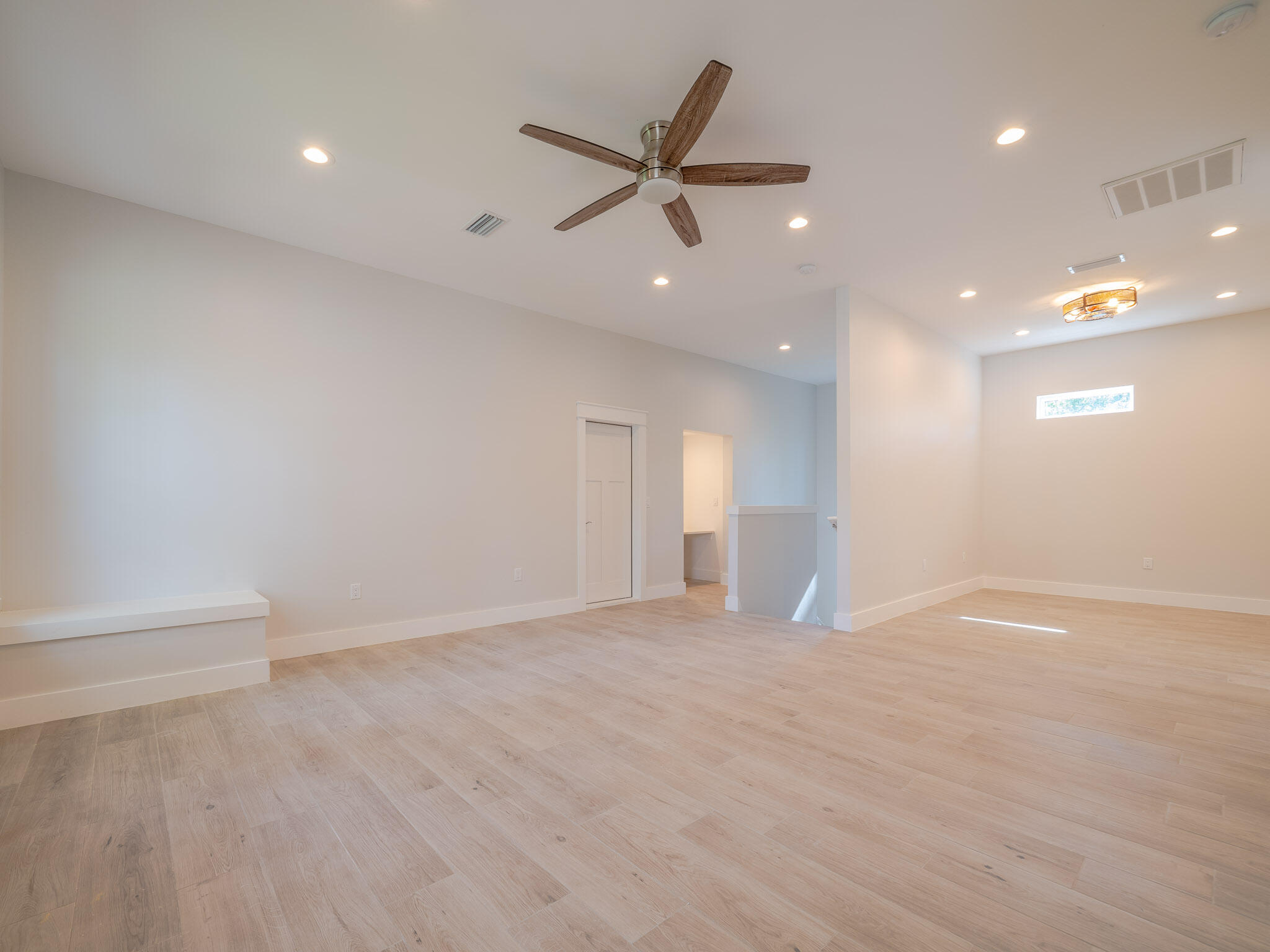 116 East Georgie Street Point Washington, FL 32459 - Photo 31 of 46 a view of an empty room with a ceiling fan