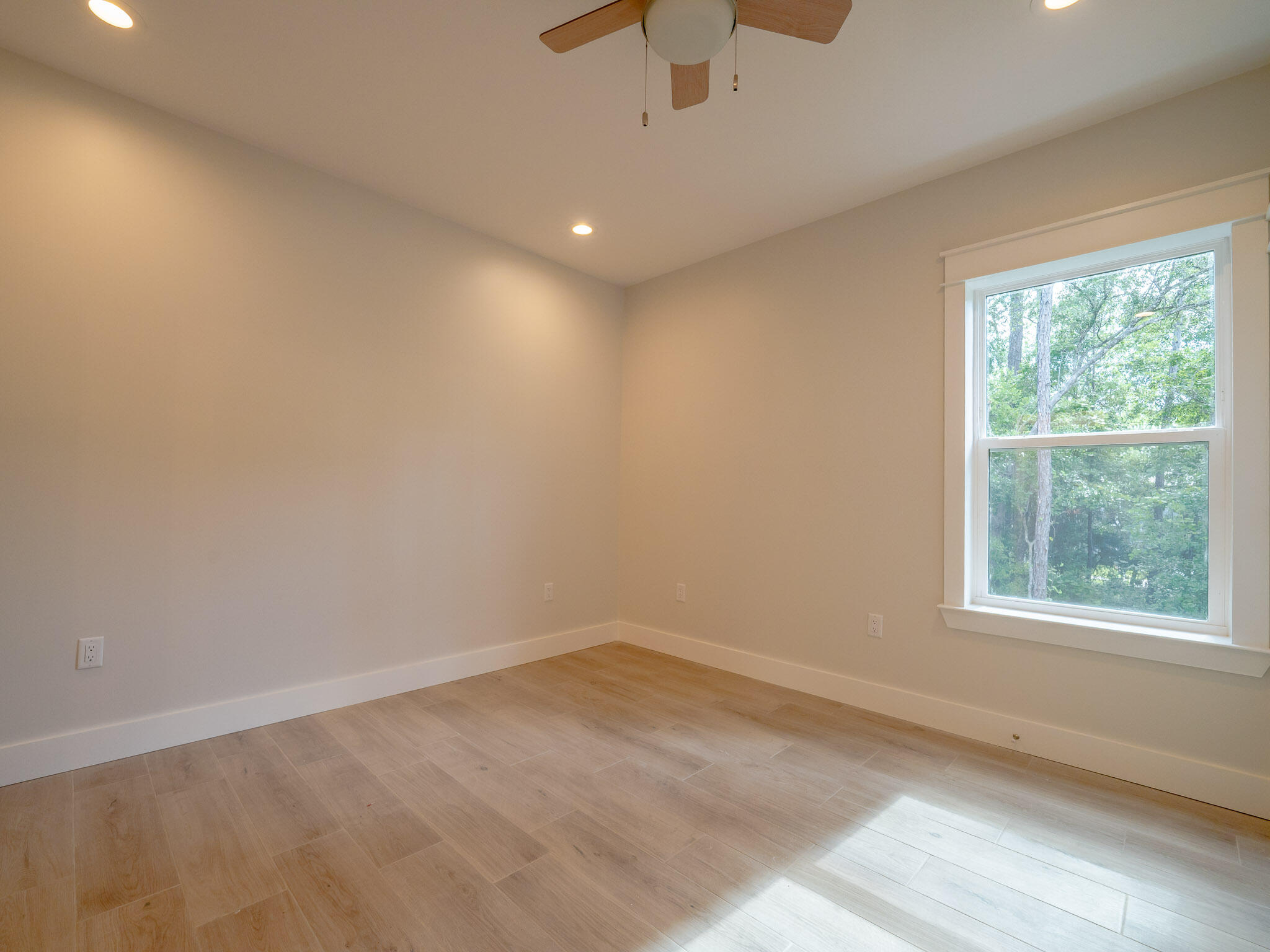 116 East Georgie Street Point Washington, FL 32459 - Photo 34 of 46 an empty room with a window