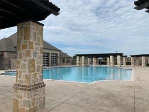 4302 Spruce Road Melissa, TX 75454 - Photo 11 of 15 a view of a backyard with swimming pool