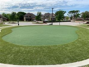 4302 Spruce Road Melissa, TX 75454 - Photo 13 of 15 a view of a swimming pool and a yard