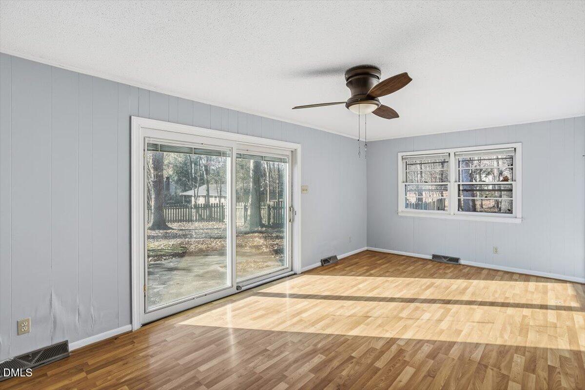 511 Hunter Street Durham, NC 27712 - Photo 15 of 31 a bedroom with a bed and a window