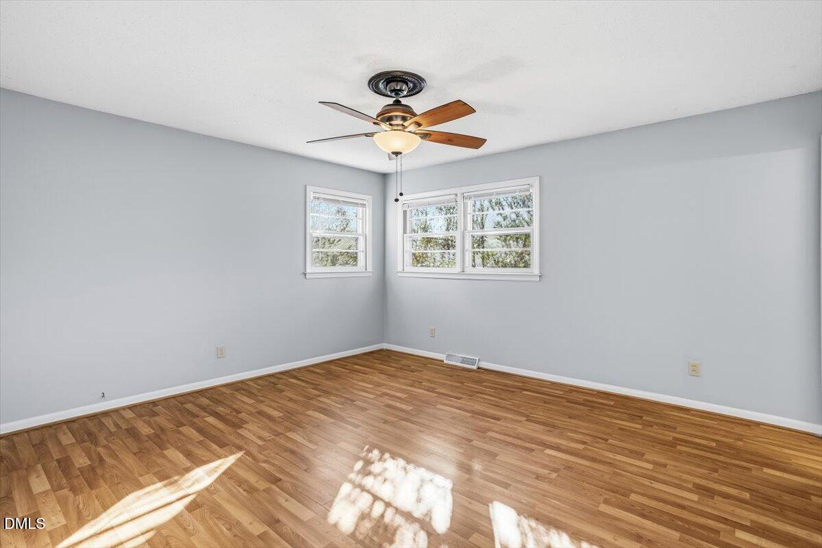 511 Hunter Street Durham, NC 27712 - Photo 18 of 31 a view of an empty room with a window