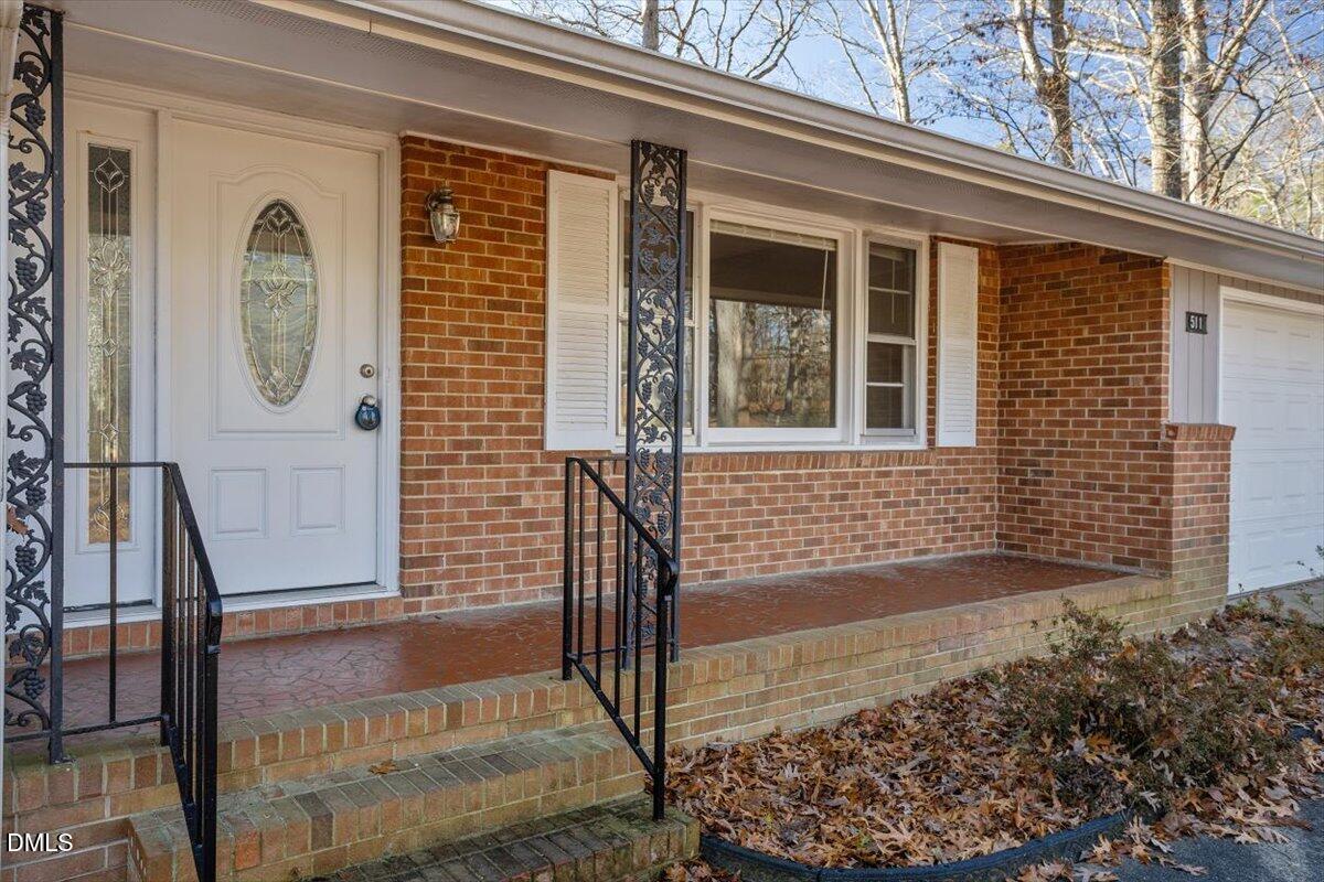 511 Hunter Street Durham, NC 27712 - Photo 4 of 31 a front view of a house with garden