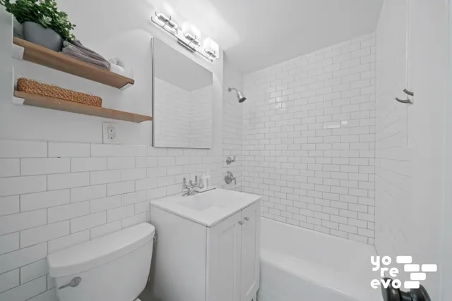 a kitchen with a stove and a microwave