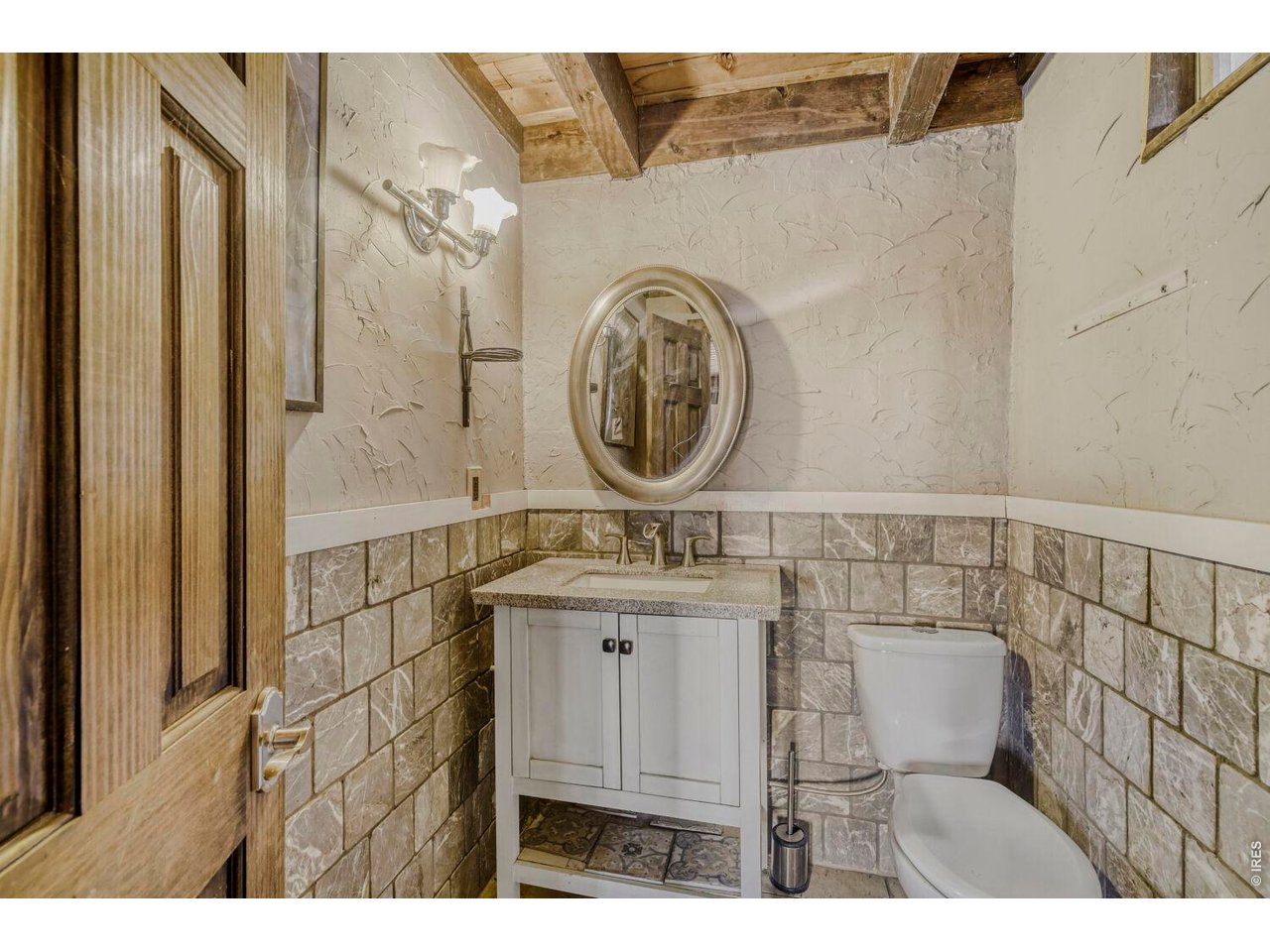 1042 Steamboat Valley Road Lyons, CO 80540 - Photo 30 of 46 Wine Cellar Bath - French Dressed bathroom walls and imported tiles.