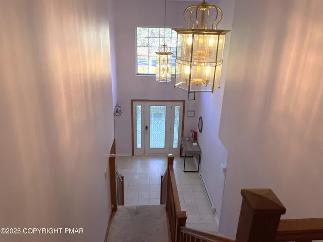 a view of hallway with windows