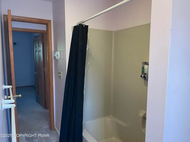 a bathroom with a bathtub