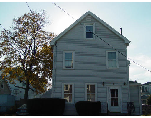 8 Spring Valley Road Boston, MA 02132 - Photo 1 of 1 a view of a house with a yard