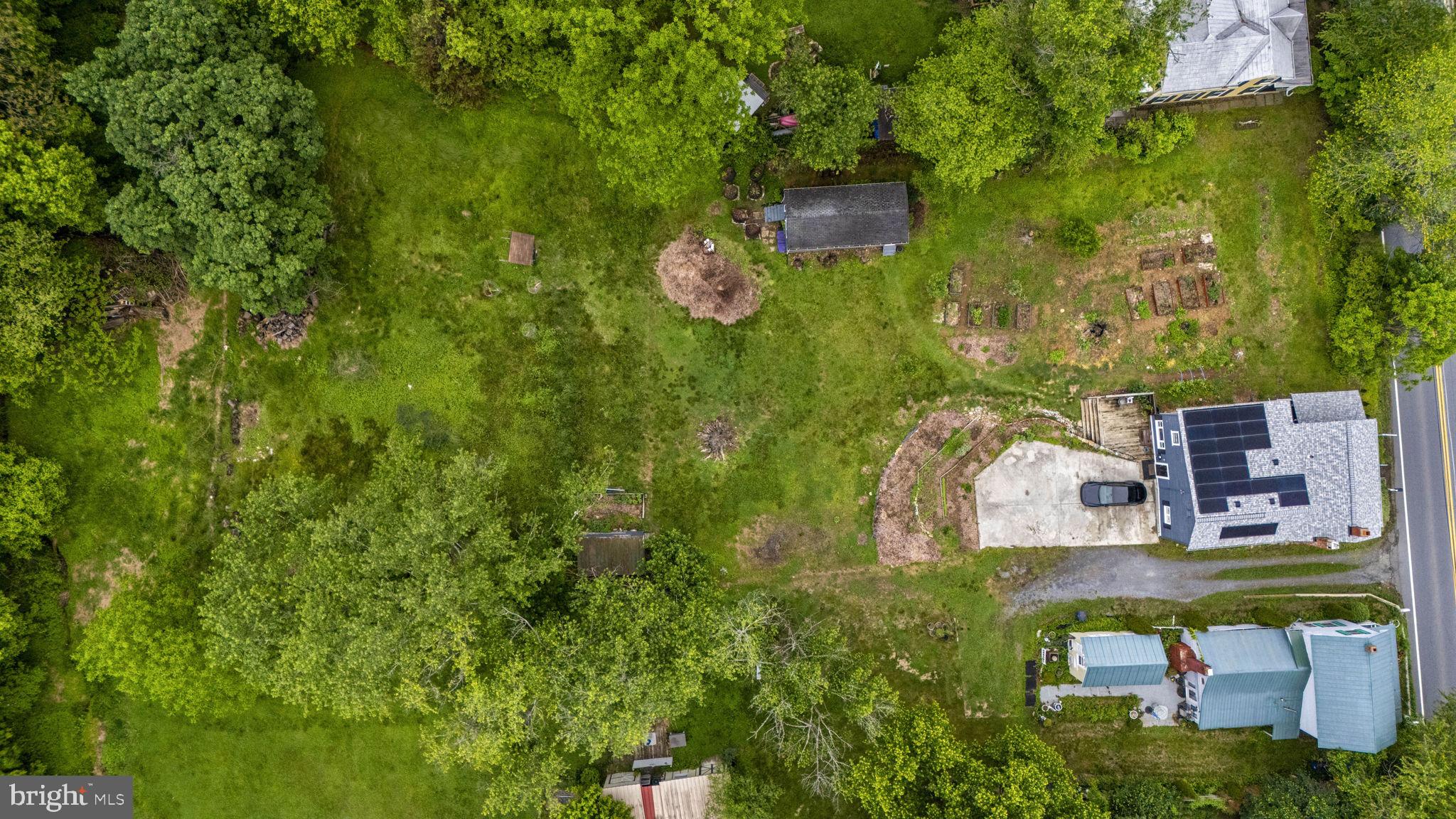 26001 Frederick Road Clarksburg, MD 20871 - Photo 42 of 46 an aerial view of a house with a yard
