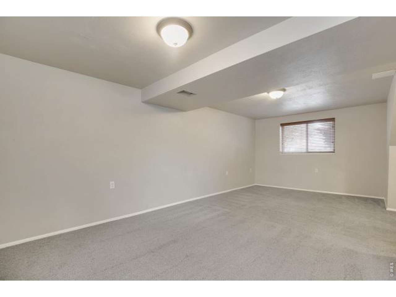10748 Routt Street Broomfield, CO 80021 - Photo 15 of 30 a view of an empty room and window