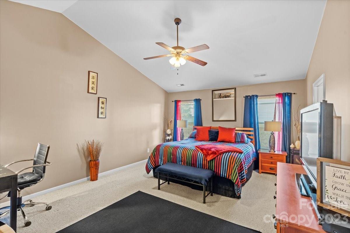 13004 Rothe House Road Charlotte, NC 28273 - Photo 22 of 27 a bedroom with furniture and window