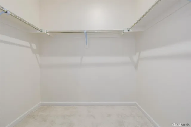 a view of a room with white walls