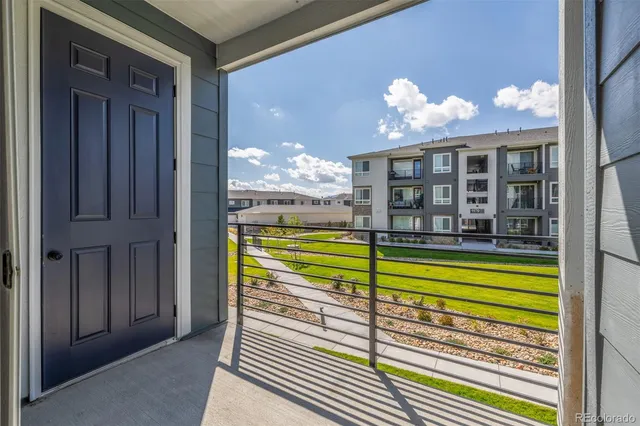 a view of a building from a balcony