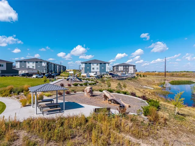 a view of a swimming pool with a chairs