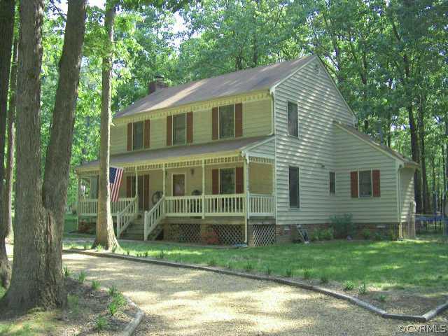 11036 Drayton Road Chester, VA 23831 - Photo 1 of 1 a view of a house with backyard