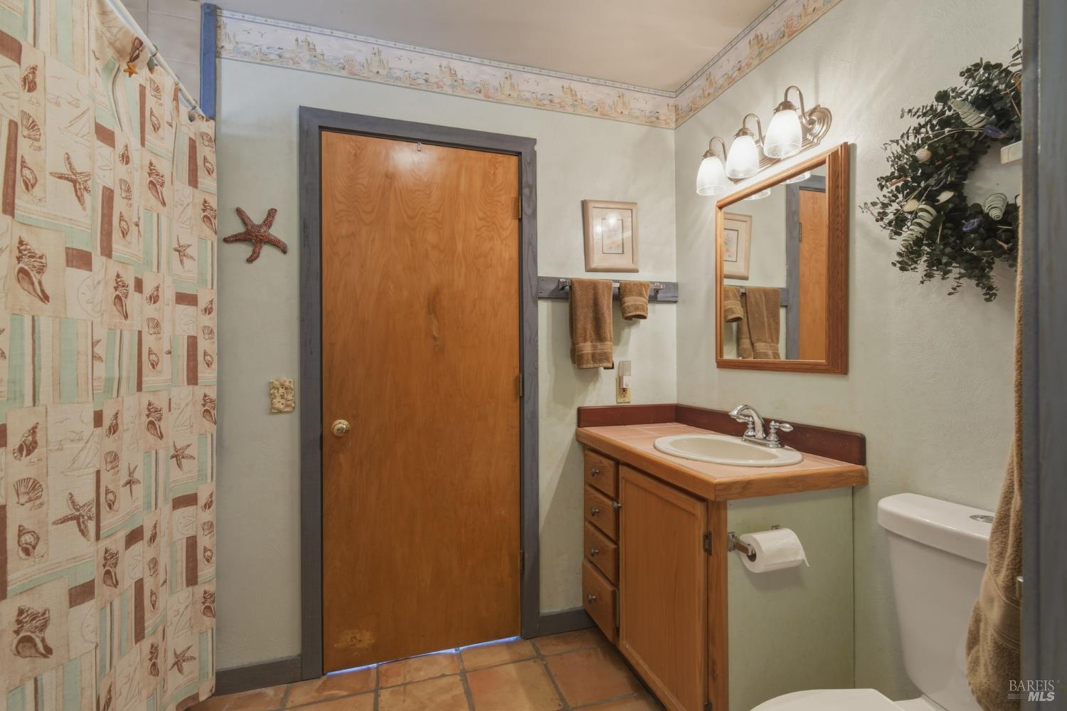 21985 Timber Cove Road Timber Cove, CA 95450 - Photo 40 of 62 Full bathroom for guests leading to second bedroom.