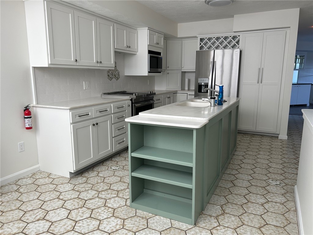 4494 Post Road, Unit 4 Warwick, RI 02818 - Photo 2 of 29 Professionally painted kitchen cabinets & new appliances