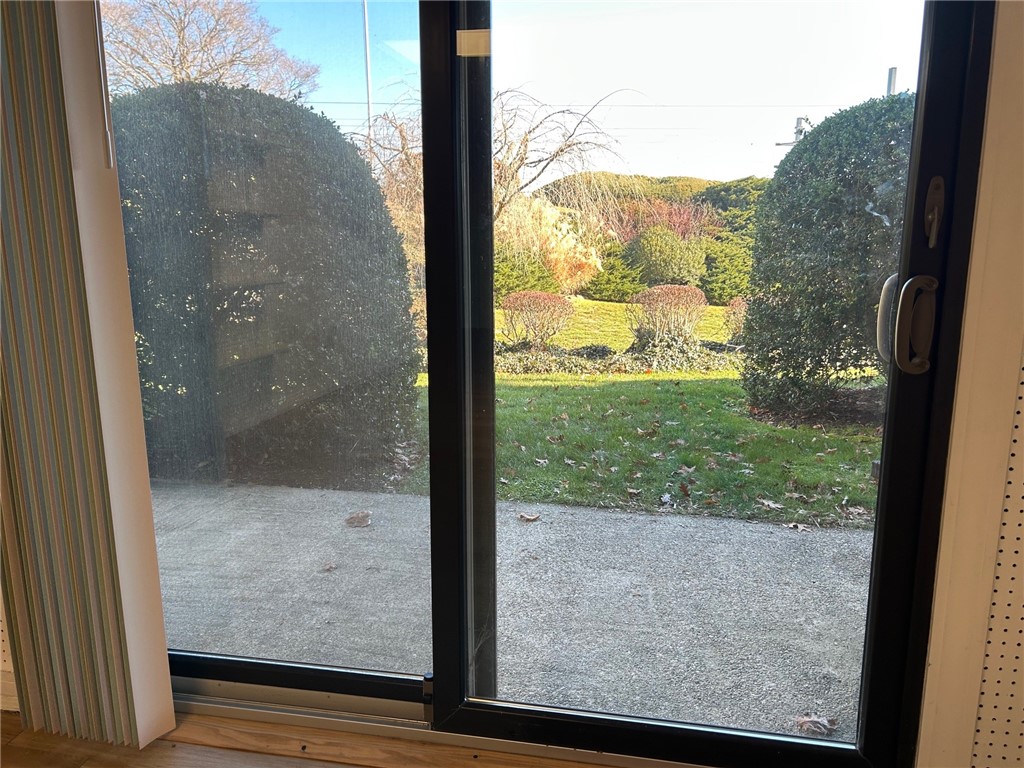 4494 Post Road, Unit 4 Warwick, RI 02818 - Photo 26 of 29 Walk out to Patio from Lower Level