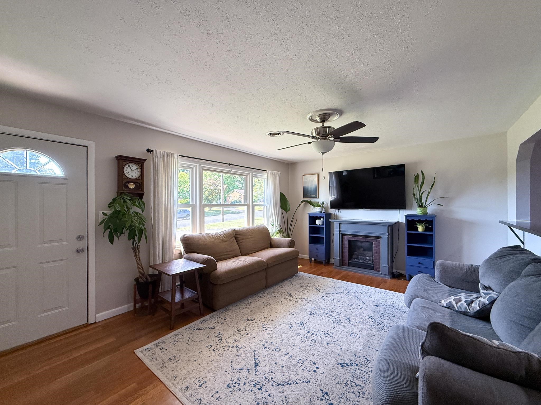 39 View Drive Stuarts Draft, VA 24477 - Photo 15 of 25 a living room with furniture and a flat screen tv
